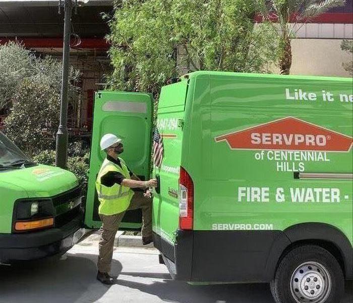 SERVPRO employee unloading tools out of van